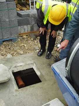 Click on image to see full-sized version Paddy Mahon observes the doctored pipe
