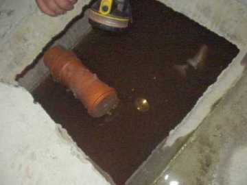 Click on image to see full-sized version The outflow pipe in operation