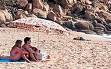 Click on image to see full-sized version in this picture taken on the same island 5 months ago, you may see a dead african on the beach in the background. The tourists still sunbathed.