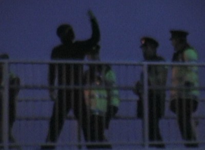 Bridge climber escorted down