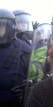 Click on image to see full-sized version riot cops