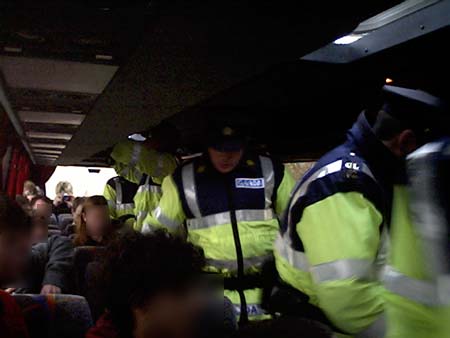 Click on image to see full-sized version cops searching the grassroots bus