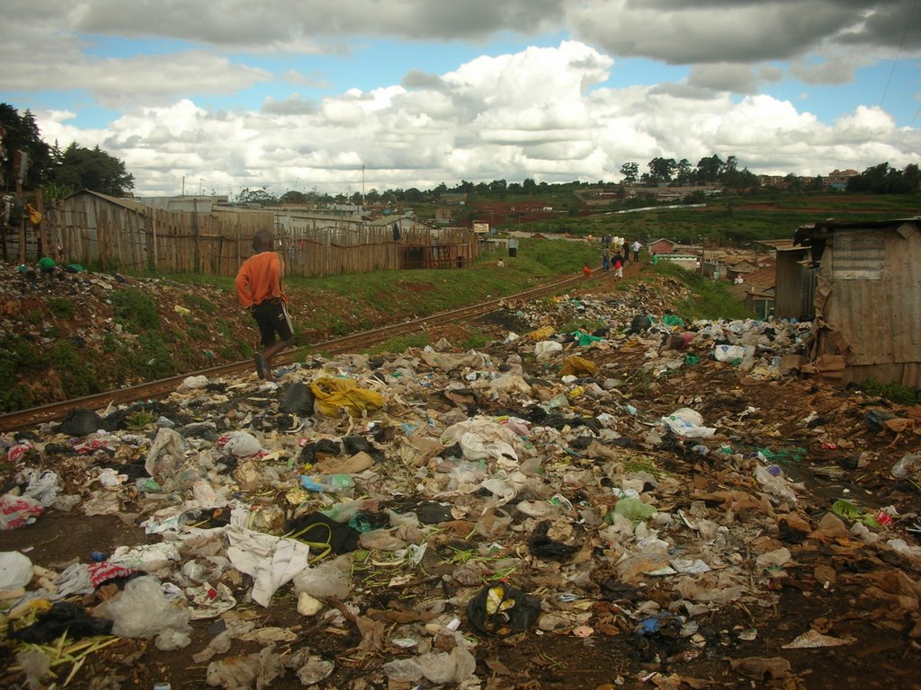 Pastor Nick Macharia working in KIbera. Kibera : squalor, disease and death