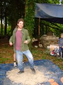 Click on image to see full-sized version Leo mixing up the cob for our oven