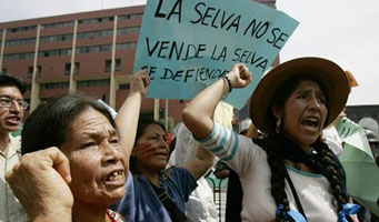 Indegenous women protesting; You cant sell the forests