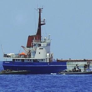 MV Rachel Corrie being boarded by Israeli Navy