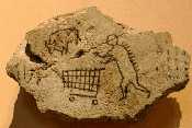 Click on image to see full-sized version a work by Banksy which hung un-noticed by the staff at the British Museum in Room 41 "babilonian exhibits"