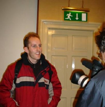 Resisting The Urge To Make A Speedy Exit, Damien Gets Interviewed For Radio Indymedia