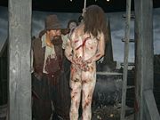 Click on image to see full-sized version A dangling Guy Fawkes, the wax version in Madame Tussaud's museum. His buddies' heads are displayed on pikes