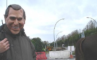 George Bush And A Horses Ass, Can You Tell The Difference?