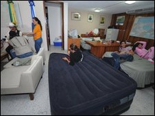 this is where president Z sleeps. hardly private. & who would have thought anyone really bought (or looted) those inflatable beds.