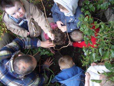 kids planting their new tree