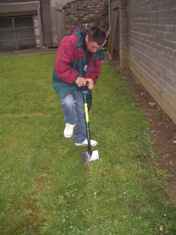 John plants the first tree in memory of a dear friend