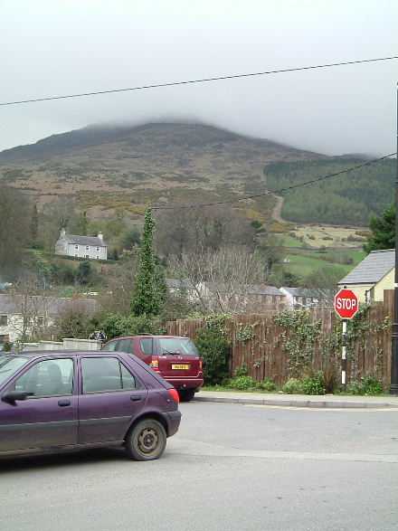 Slieve Foye, behind Holy Trinity, with its head in the clouds