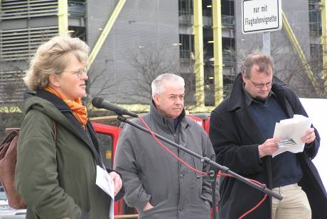 Christian Fhrer and Tobias Pflger wait to speak at Leipzig-Halle
