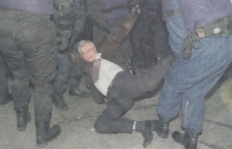 Click on image to see full-sized version Joe Higgins being 'lovingly treated' by Gardai at an anti-war demo