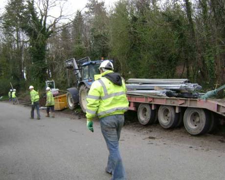 Fence poles arriving