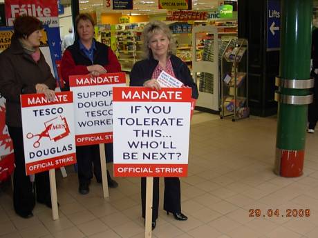 Click on image to see full-sized version Workers picketing