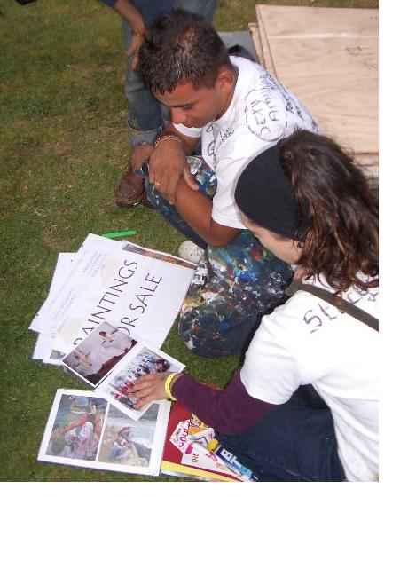 sharon and julio with a lot of paint on his trousers