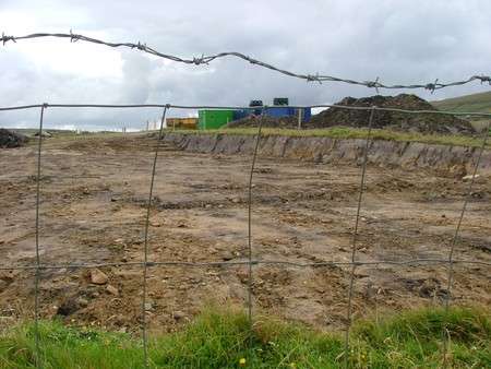 View into compound from cliff top...