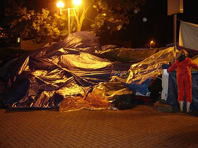 BAA car park entrance blocked by impromptu tent structure full of climate change activists