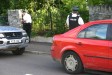 Jim arrested in the back of the car