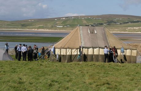 Garda come to the camp to deliver an ultimatum. 