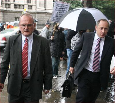 Gerry Doherty (left) rushing back to court with solicitor.
