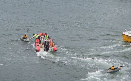 Kayaker eluding the chasing goons