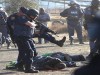 the_lonmin_massacre_putting_the_capitalist_boot_in.jpg