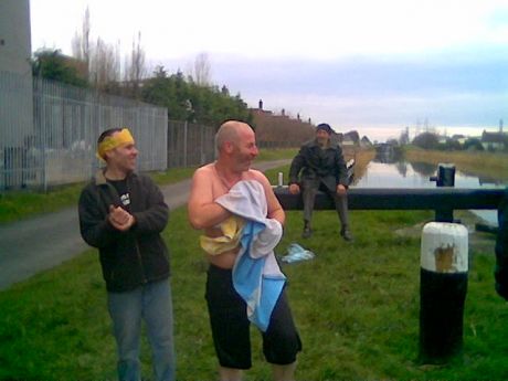 This swimmer and his two mates turned the tables - they threw the crowd into the water!