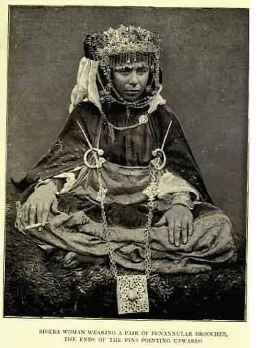 An Algerian lady wearing a Celtic style brooch