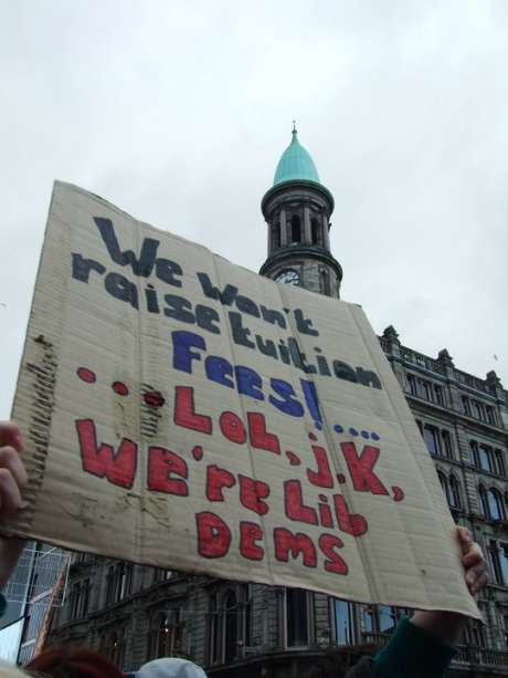Click on image to see full-sized version One banner criticising the Liberal Democrats in the UK on going back on their promise to fight a rise in tuition fees