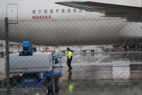 Garda guarding US warplane at Shannon terminal building 30 Dec 2011