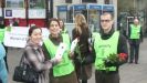 Amnesty International activists handing out roses