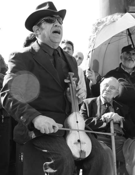 This man sang an amazing song accompanying himself on a two-stringed homemade fiddle