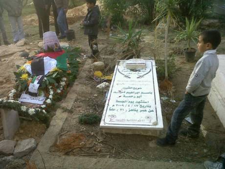 Jawaher Abu Rahmah is laid to rest next to her brother Bassem Abu Rahmah, who was also killed during a peaceful protest in Bil'in. (Photo: Joseph Dana via twitter)