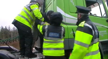 Pulling one protestor down from a truck