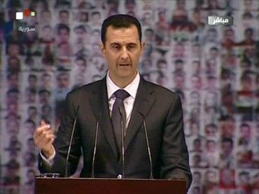 Click on image to see full-sized version An image grab taken from the state-run Syrian TV shows Syria's embattled President Bashar al-Assad making a public address on the latest developments in the country and the region on January 6, 2013 (AFP Photo)