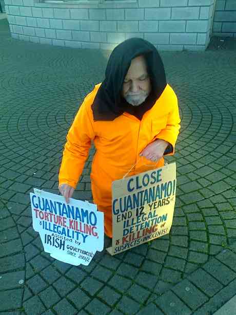 Click on image to see full-sized version Colm with placards
