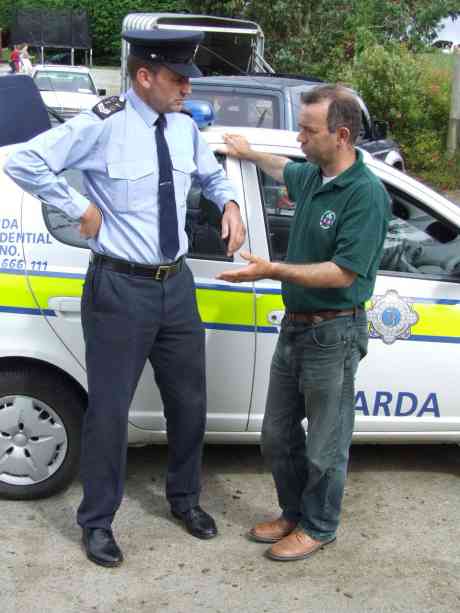 Joe chats with a local Garda.