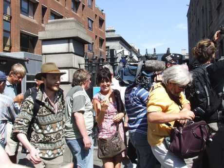 Supporters Circle The Media Scrum