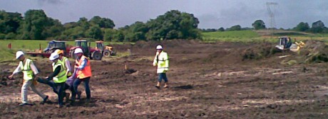 Protestor Being carried off site trying to stop digger