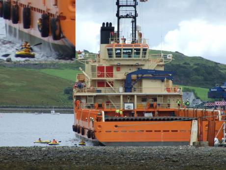 One S2S activist occupies tyre at side of Shell ship in Killybegs