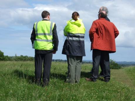 NRA people looking at the Valley - their backs to the committee members