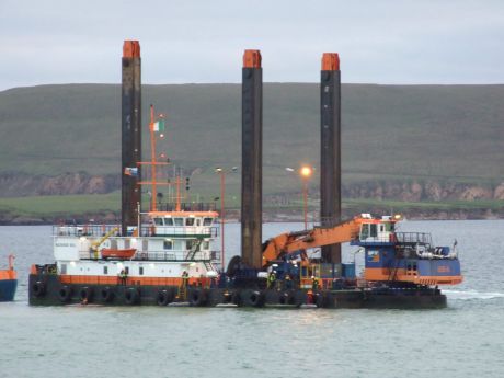 Kayakers lined up ready to board the dredger