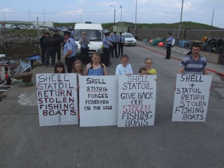 Citizens protesting the theft of the O'Donnells' boats