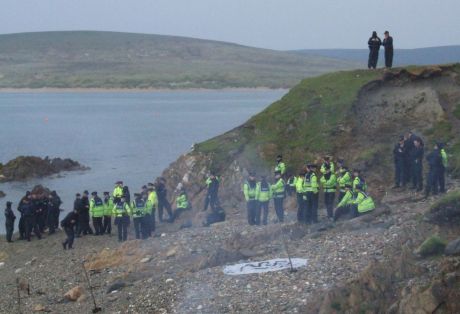 47 Gardai in shot on the beach below the Solidarity Camp