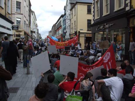 The march sits down on Oliver Plunkett St.