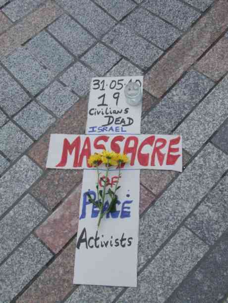 Click on image to see full-sized version One of the many cardboard crosses at the vigil
